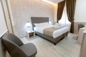 Hotel Maximus客房内的一张或多张床位