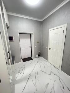 Gallery image of ЖК Брюссель 2 Апартаменты с кроватью и диваном in Taldykolʼ