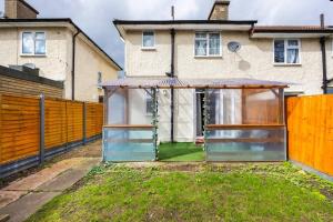 an extension to a house with a fence at 1 Bedroom Flat in Bromley in Hither Green