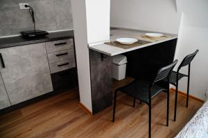 Dapur atau dapur kecil di Apartman Metropol 1