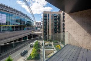 an overhead view of a city street with buildings at Spacious Two Bedroom Apartment at Wembley Park in London