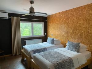 Uma cama ou camas num quarto em Casa Carvalhal - Adults Only
