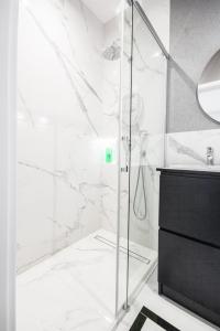 Kúpeľňa v ubytovaní VipWarsawApartments Sapphire Mennica Residence