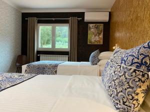 Uma cama ou camas num quarto em Casa Carvalhal - Adults Only