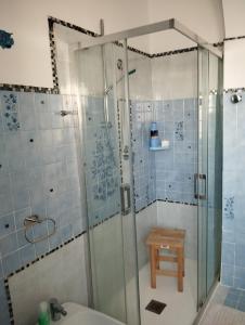 a bathroom with a shower and a sink at La Maddalena b&b da Marco in La Maddalena +30 photos