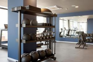a room with several shelves filled with baseball bowls at Sunprime Pollensa Bay in Alcudia