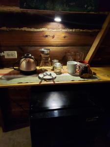O bucătărie sau chicinetă la Humble Boy Retreat Storeroom Cabin