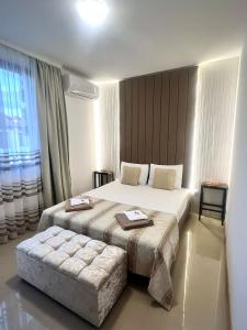 Ένα ή περισσότερα κρεβάτια σε δωμάτιο στο Luxury Lighthouse Golf Villa