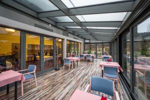 Reštaurácia alebo iné gastronomické zariadenie v ubytovaní Sport Art Centrum