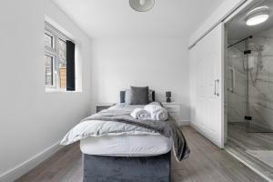 Säng eller sängar i ett rum på Stylish 3Bedroom House in Prime Leicester Location