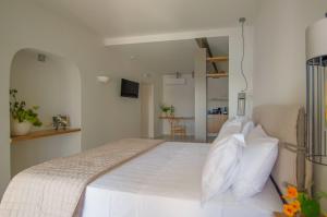 Voodi või voodid majutusasutuse Floris Manor toas
