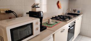 Kuchyň nebo kuchyňský kout v ubytování "Casa Sofia" appartamento Raffalda ZONA CLINICA