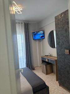 Telewizja i/lub zestaw kina domowego w obiekcie Meli Μaisonette