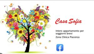 a tree with flowers and butterflies on it at "Casa Sofia" appartamento Raffalda ZONA CLINICA in Piacenza