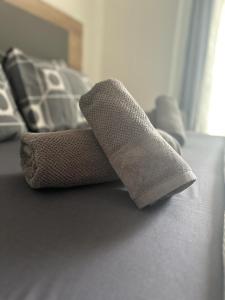 Łóżko lub łóżka w pokoju w obiekcie Meli Μaisonette