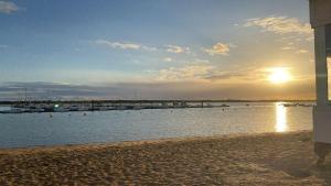 a view of a marina with boats in the water at Playa Rompido in Huelva