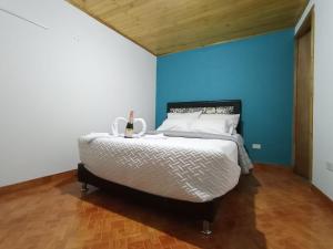Letto o letti in una camera di Guaxique