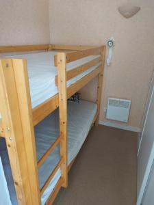 Palanda nebo palandy na pokoji v ubytování Appartement Hardelot plage