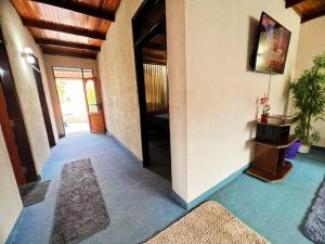 a hallway of a house with a room with a hallway at Hotel Palermo in Santa Cruz de la Sierra