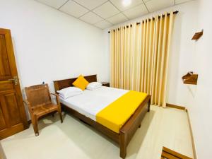 Katil atau katil-katil dalam bilik di Carmel Hill Resort