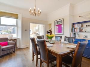 a dining room with a table and chairs at 3 Bed in Spittal CN168 in Spittal