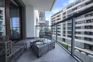 Balkon lub taras w obiekcie Kazou Residence Arkadia