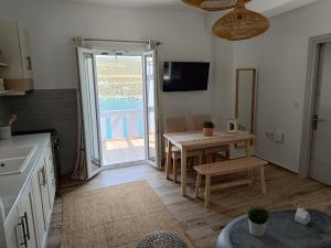 Kuchyň nebo kuchyňský kout v ubytování Seafront Haven + 31 fotografií