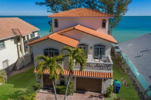 a house with a view of the ocean at Dolphins Run home in Anna Maria