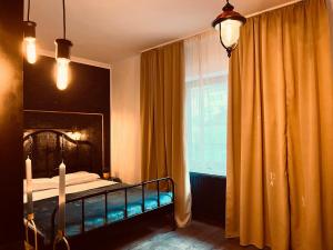 Postel nebo postele na pokoji v ubytování Cozy Hideout - Condo Hotel