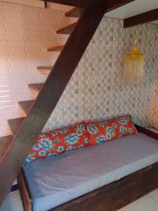Un pat sau paturi într-o cameră la Casa Girassol