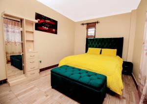 Ένα ή περισσότερα κρεβάτια σε δωμάτιο στο Urban Elegance