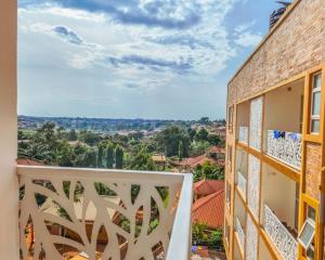 a balcony with a view of the city at Summer in Garuga in Entebbe