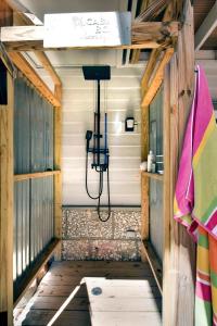 an inside view of a sauna with a shower at HG Coastal in Demere Park