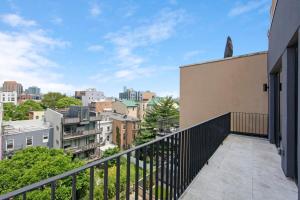 a balcony with a view of a city at 149BK-601 NEW PH 2BR-2Bath Private Rooftop W D in Brooklyn
