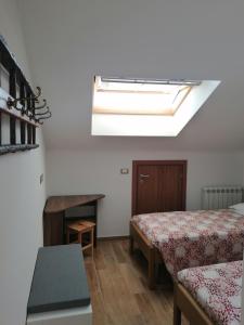 Letto o letti in una camera di Agriturismo Caruggiu di via vecchia