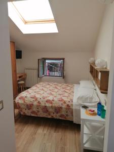 Letto o letti in una camera di Agriturismo Caruggiu di via vecchia