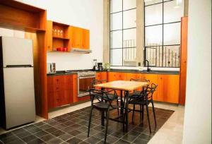 Kuchyň nebo kuchyňský kout v ubytování Beautiful loft in Colonia Americana