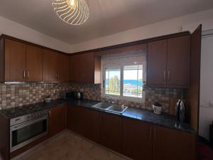 Η κουζίνα ή μικρή κουζίνα στο Vila Islands View