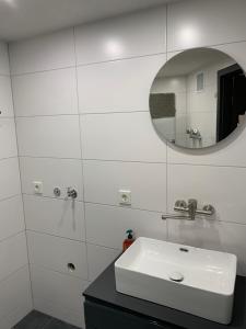 Koupelna v ubytování Apartment Aqualonnähe