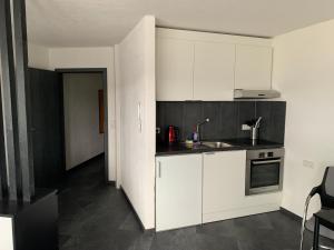 Kuchyň nebo kuchyňský kout v ubytování Apartment Aqualonnähe