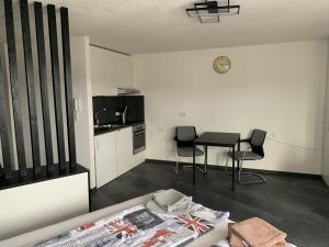Kuchyň nebo kuchyňský kout v ubytování Apartment Aqualonnähe