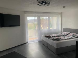 Postel nebo postele na pokoji v ubytování Apartment Aqualonnähe