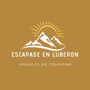 un logo pour un restaurant avec une montagne dans l'établissement L'atelier de Guytou et Spa, à Cheval-Blanc