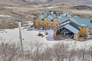 an aerial view of a building in the snow at Ski-InandSki-Out Park City Studio Community Hot Tub in Park City