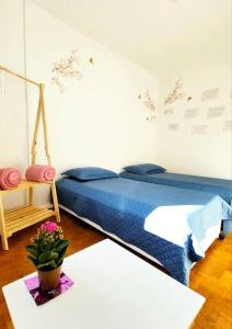 Postel nebo postele na pokoji v ubytování Apto 3 quartos, no Centro. Temático e acolhedor! + 16 fotografií