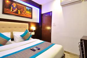 Postel nebo postele na pokoji v ubytování Hotel Nirmal Mahal - Paharganj - New Delhi