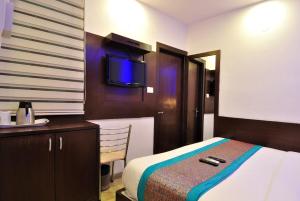 Postel nebo postele na pokoji v ubytování Hotel Nirmal Mahal - Paharganj - New Delhi