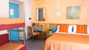 Postel nebo postele na pokoji v ubytování Hotel Diana