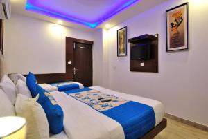 TV a/nebo společenská místnost v ubytování Hotel Nirmal Mahal - Paharganj - New Delhi