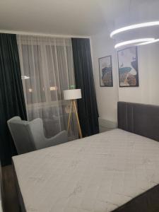 Postel nebo postele na pokoji v ubytování Jagodica
